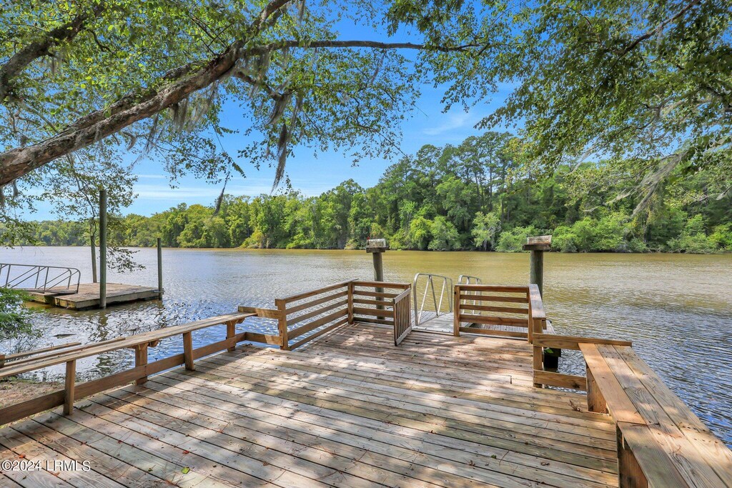 dock area with a water view