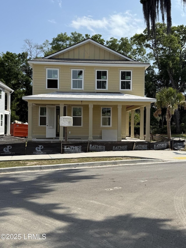 view of front facade featuring a porch and board and batten siding