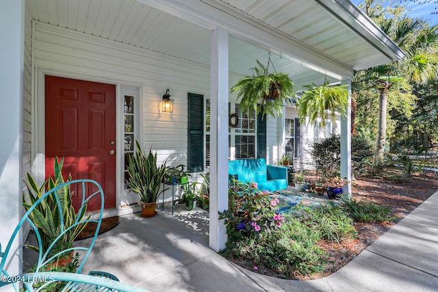 doorway to property featuring a porch