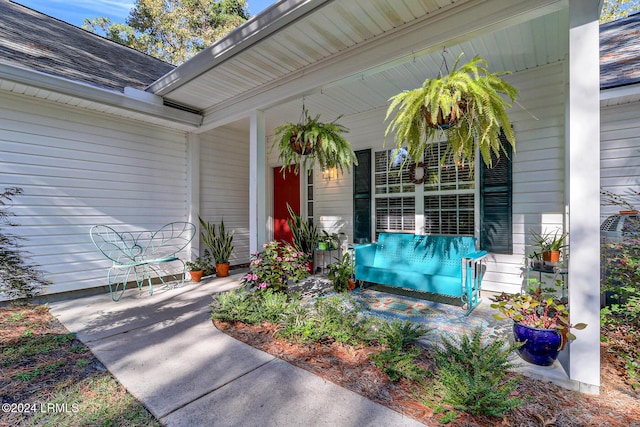 entrance to property with a porch