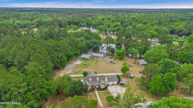 18 Lake View Ct, Bluffton, SC 29910 - aerial view of property and surrounding area featuring a heavily wooded area