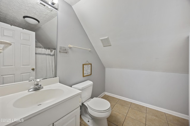 18 Lake View Ct, Bluffton, SC 29910 - bathroom with baseboards, lofted ceiling, toilet, tile patterned flooring, and vanity