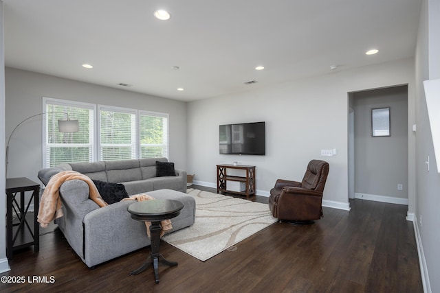 145 Rudder Run, Bluffton, SC 29910 - living room featuring baseboards, dark wood-type flooring, and recessed lighting