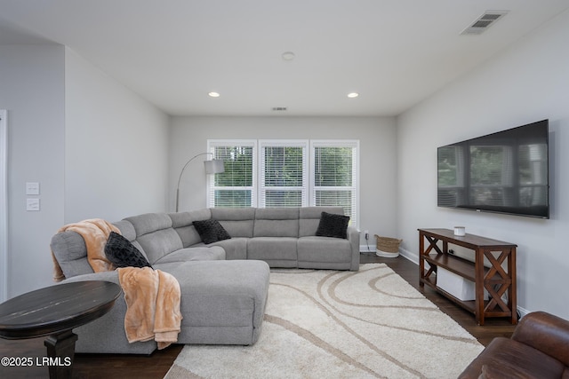 145 Rudder Run, Bluffton, SC 29910 - living area featuring dark wood-style flooring, recessed lighting, and baseboards