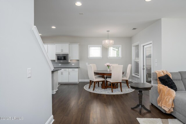 145 Rudder Run, Bluffton, SC 29910 - dining area with dark wood finished floors, recessed lighting, baseboards, and a chandelier