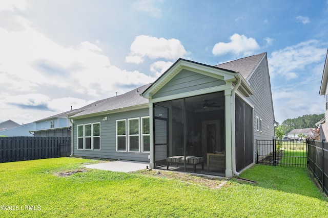 145 Rudder Run, Bluffton, SC 29910 - back of house featuring a sunroom, roof with shingles, and a patio