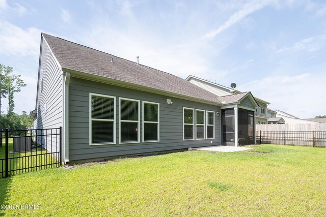 145 Rudder Run, Bluffton, SC 29910 - rear view of property featuring a sunroom, a patio area, and roof with shingles