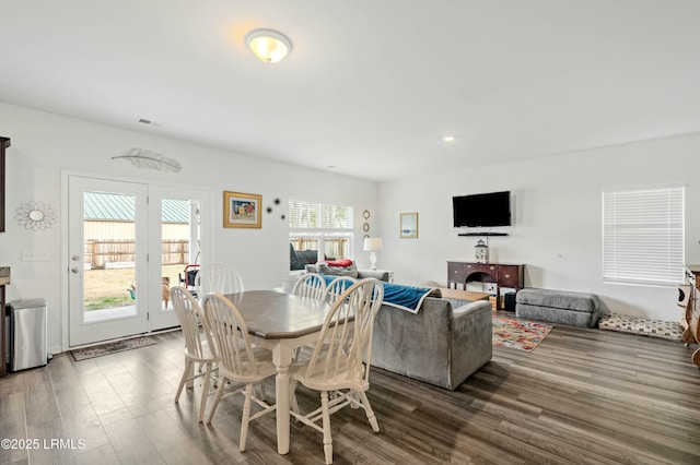 dining room with recessed lighting, visible vents, and wood finished floors