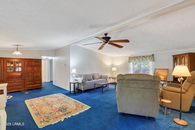 carpeted living room featuring a textured ceiling, vaulted ceiling, and a ceiling fan