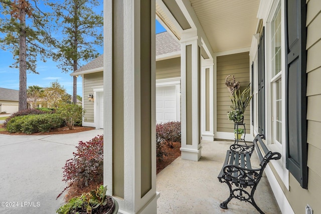 view of patio featuring a garage