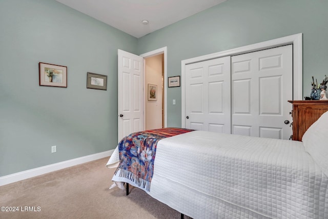 carpeted bedroom featuring a closet