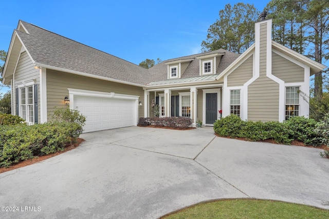 view of front of property with a garage