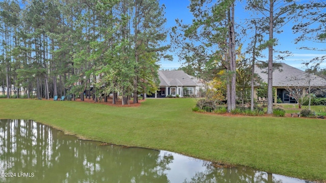 view of yard with a water view