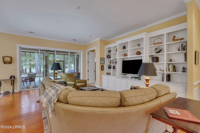 living room featuring crown molding and light wood-type flooring