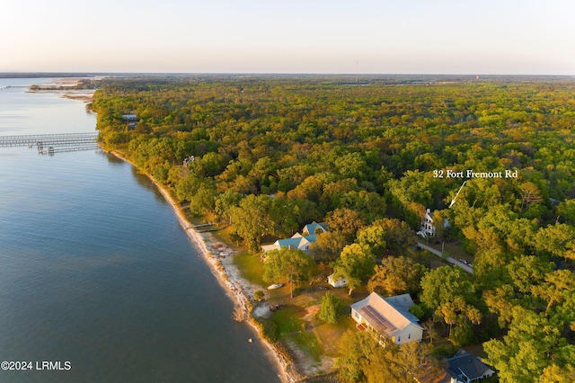 aerial view at dusk with a water view