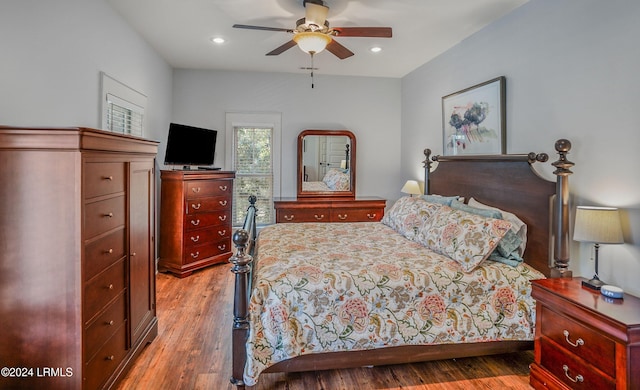 bedroom featuring hardwood / wood-style flooring and ceiling fan