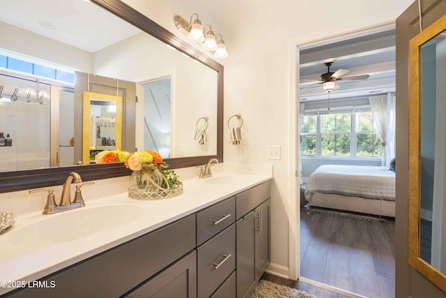 bathroom with vanity, wood-type flooring, and ceiling fan