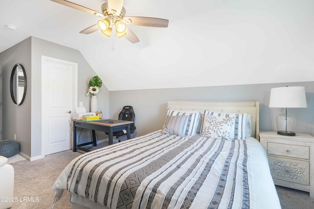 carpeted bedroom featuring lofted ceiling and ceiling fan