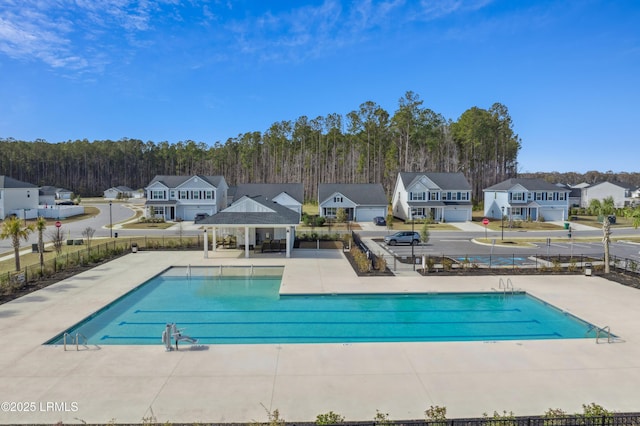 view of swimming pool featuring a gazebo and a patio