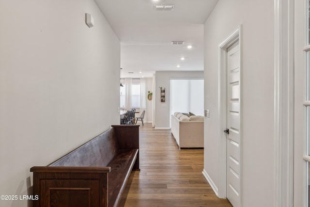 hallway featuring wood-type flooring