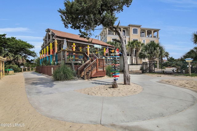 663 William Hilton Pkwy Unit 3404, Hilton Head Island, SC 29928 - surrounding community featuring curved driveway, fence, and a gate