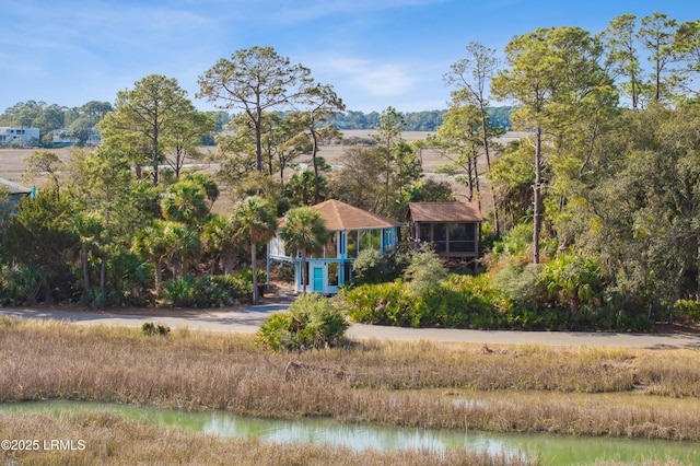 exterior space with a water view