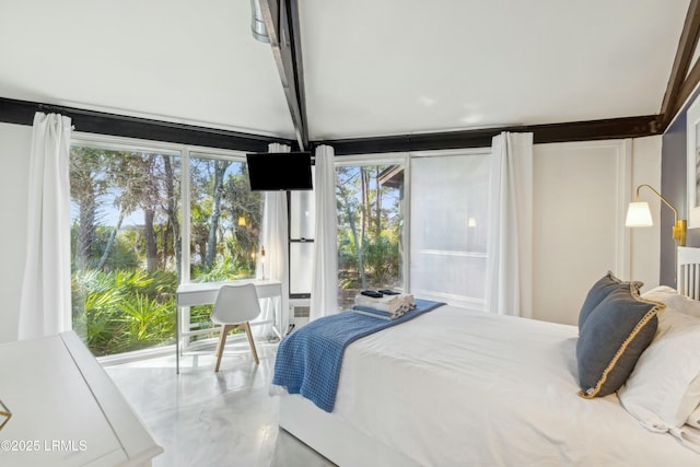 bedroom featuring beamed ceiling