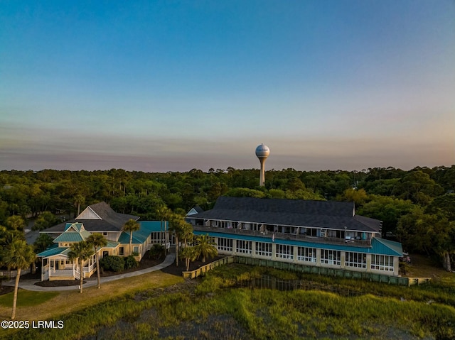 aerial view at dusk with a forest view