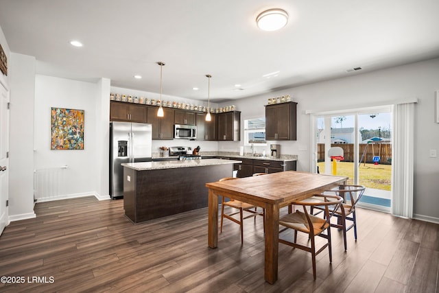 dining room featuring visible vents, recessed lighting, dark wood-type flooring, and baseboards