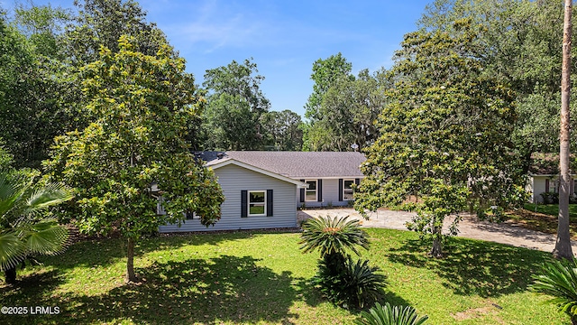 3017 Magnolia St, Beaufort, SC 29906 - view of front of home with a front lawn and roof with shingles
