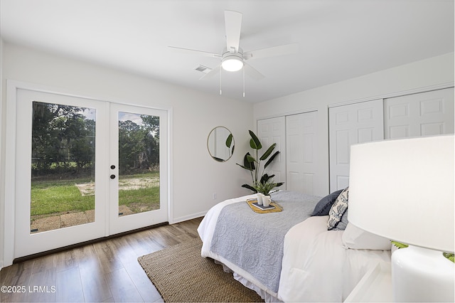3017 Magnolia St, Beaufort, SC 29906 - bedroom featuring two closets, access to outside, wood finished floors, french doors, and baseboards