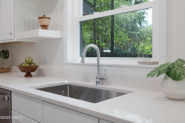 3017 Magnolia St, Beaufort, SC 29906 - kitchen with a sink, healthy amount of natural light, white cabinetry, and light countertops