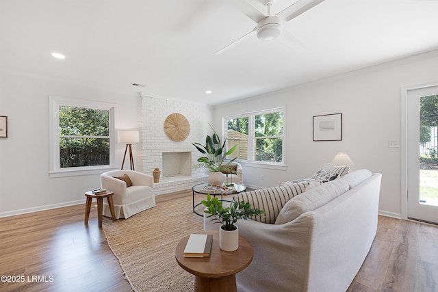 3017 Magnolia St, Beaufort, SC 29906 - living room with healthy amount of natural light, light wood finished floors, recessed lighting, and crown molding