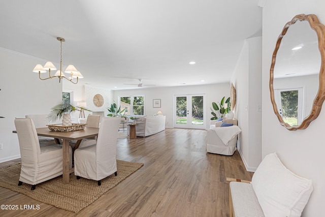 3017 Magnolia St, Beaufort, SC 29906 - dining space with wood finished floors, a chandelier, baseboards, recessed lighting, and ceiling fan