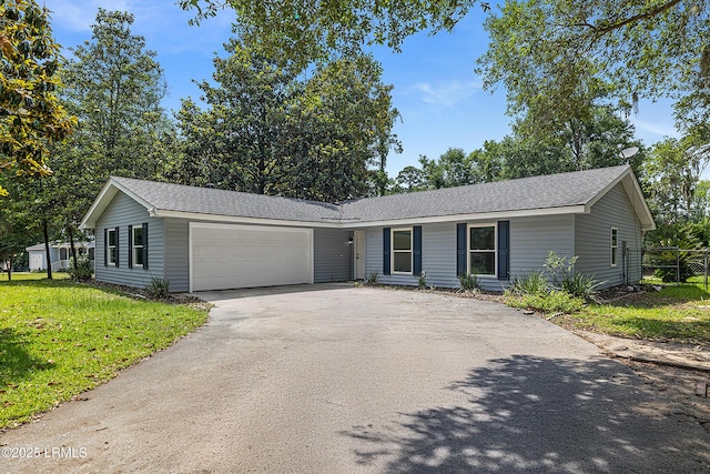 3017 Magnolia St, Beaufort, SC 29906 - ranch-style home featuring asphalt driveway, a garage, and a shingled roof