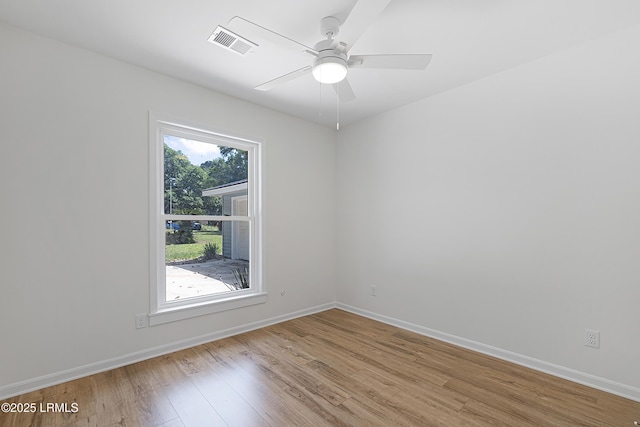 3017 Magnolia St, Beaufort, SC 29906 - empty room featuring light wood-type flooring and baseboards