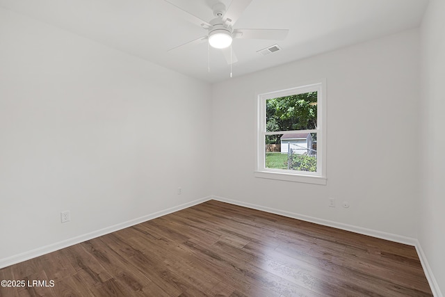3017 Magnolia St, Beaufort, SC 29906 - unfurnished room with dark wood-style flooring, baseboards, and ceiling fan