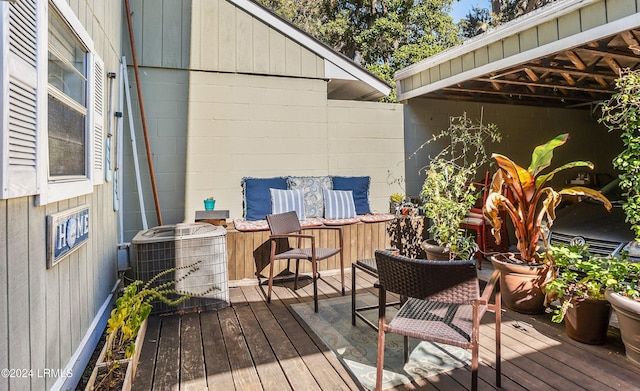 deck featuring central air condition unit