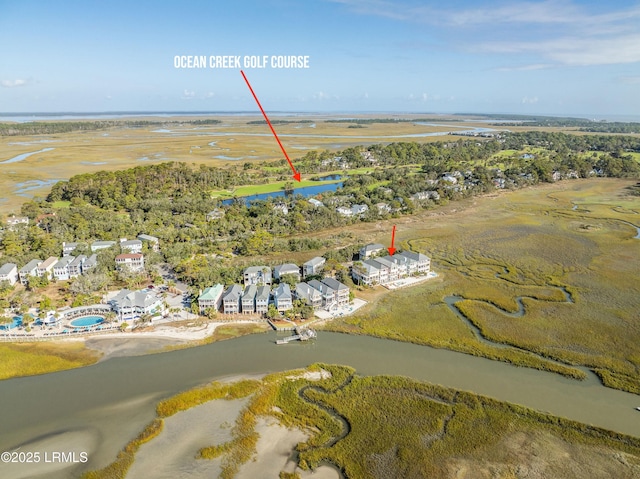 birds eye view of property with a residential view and a water view