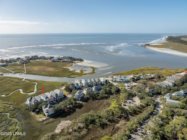 bird's eye view with a residential view and a water view