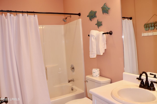 full bath featuring shower / bath combination with curtain, toilet, and vanity