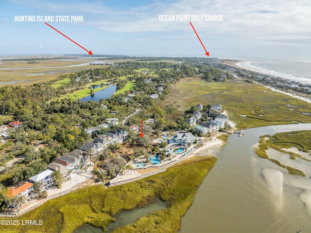 bird's eye view with a water view