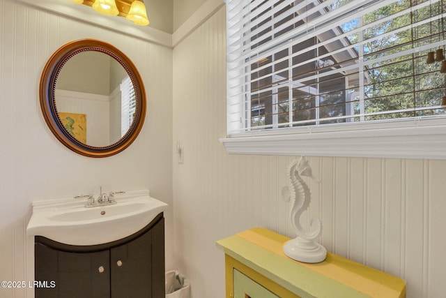 bathroom with a healthy amount of sunlight and vanity