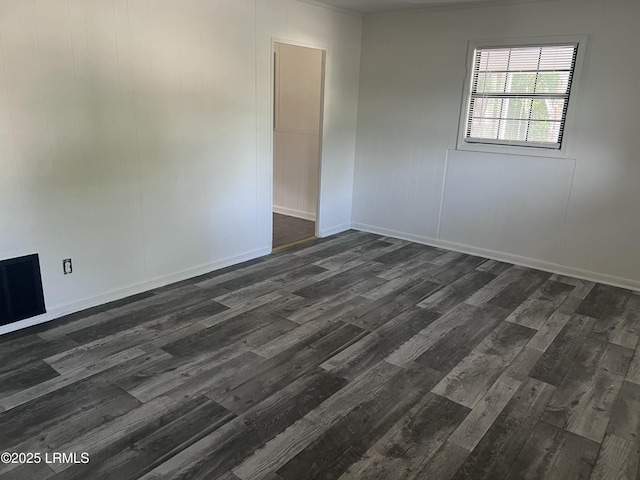 582 Parkwood Ter, Allendale, SC 29810 - spare room featuring dark wood-style floors and baseboards