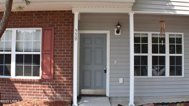 539 Candida Dr, Beaufort, SC 29906 - property entrance featuring brick siding