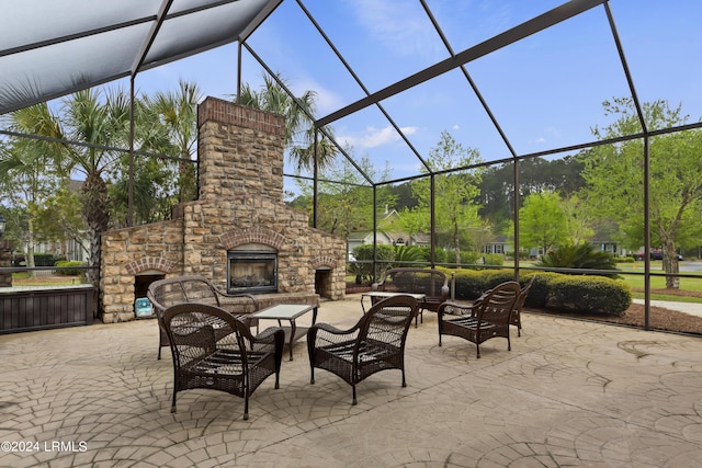 1034 Abbey Glen Way, Hardeeville, SC 29927 - view of patio / terrace featuring glass enclosure and an outdoor living space with a fireplace