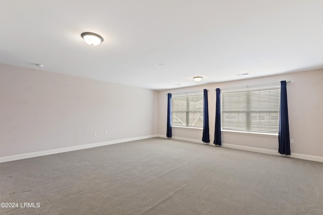 1034 Abbey Glen Way, Hardeeville, SC 29927 - carpeted spare room with baseboards