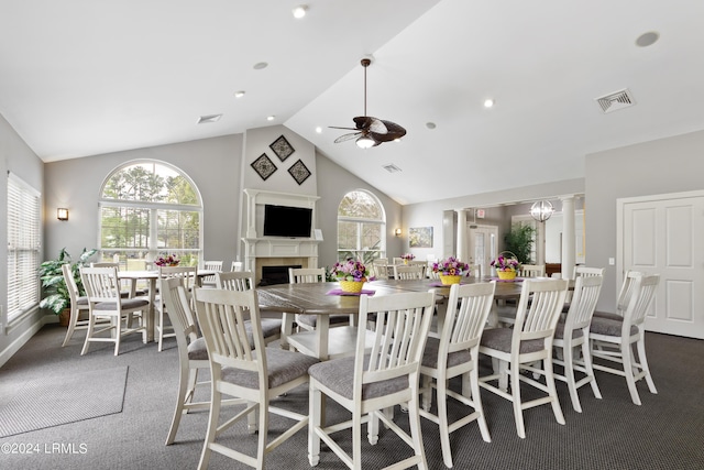 1034 Abbey Glen Way, Hardeeville, SC 29927 - carpeted dining space featuring ceiling fan, visible vents, a healthy amount of sunlight, and a fireplace