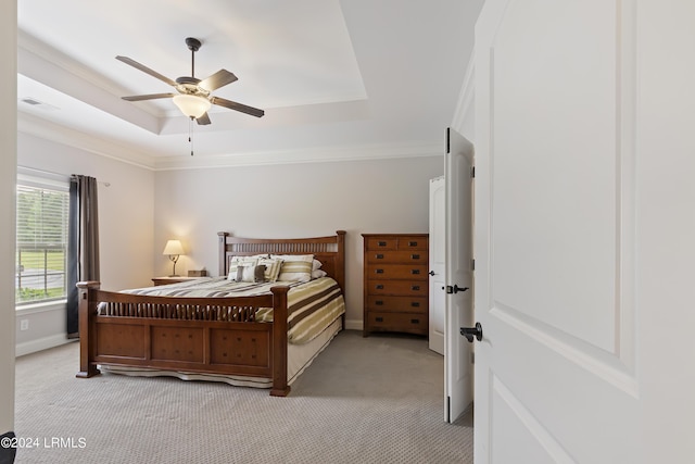 1034 Abbey Glen Way, Hardeeville, SC 29927 - bedroom featuring crown molding, light carpet, baseboards, a tray ceiling, and visible vents