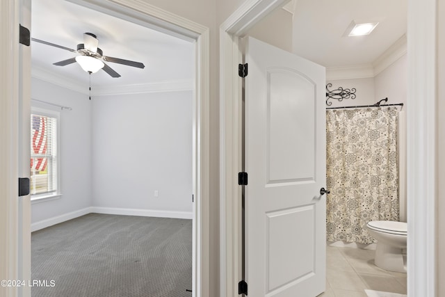 1034 Abbey Glen Way, Hardeeville, SC 29927 - bathroom featuring ornamental molding, curtained shower, toilet, baseboards, and ceiling fan